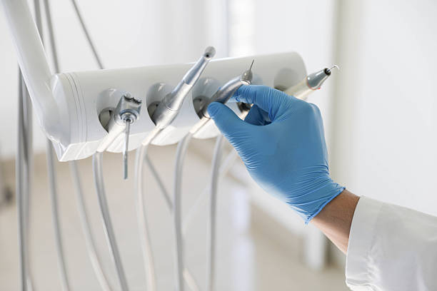 Professional Tooth Extraction technician working in San Clemente, CA